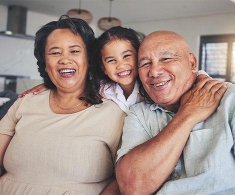 portrait of grandparents with their granddaughter retirement future